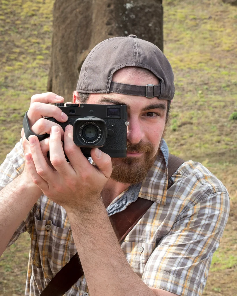 A photograph of Brian Leary aiming his camera to take a picture of the photographer taking this picture.