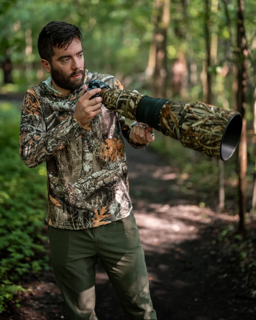 Photographer Chris Laracy lines up a wildlife photo.